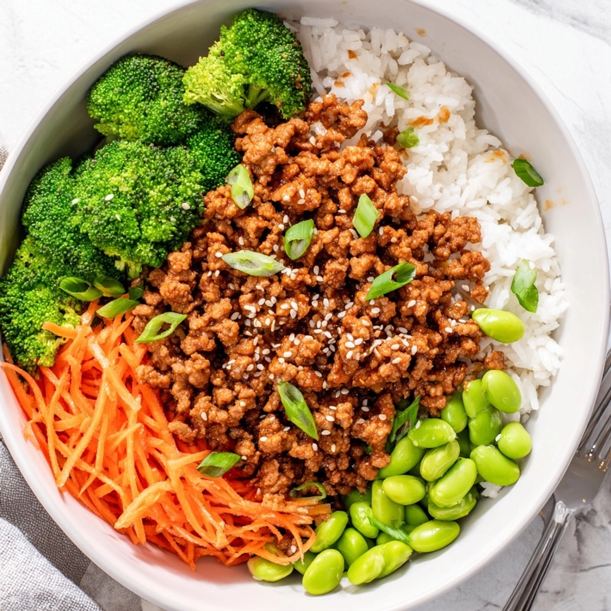 Savory Turkey Teriyaki Bowls, ready to eat, steam rising, garnished with fresh green onions.