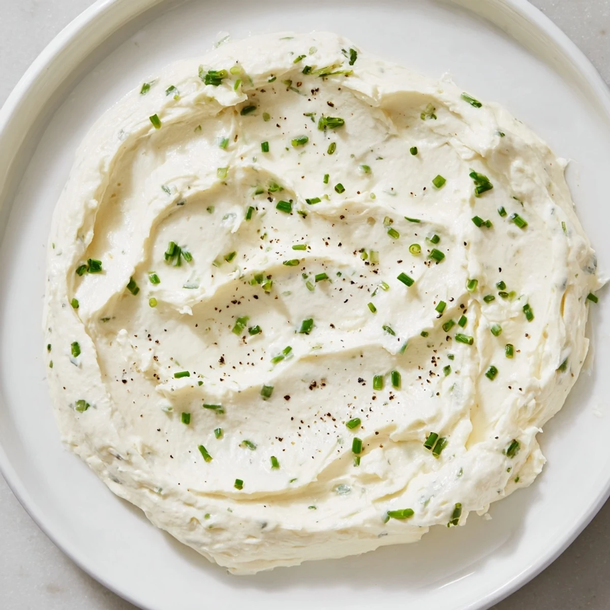 This easy creamy dip base shows a thick, white texture ready for flavorful additions and serving.