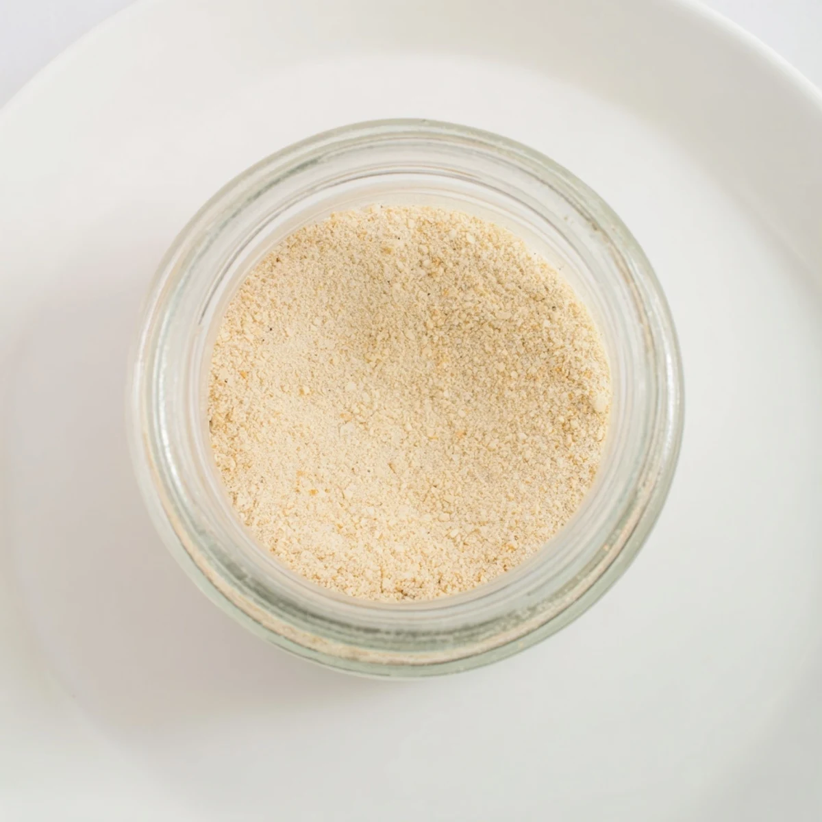 Freshly ground Powdered Garlic, aromatic and golden, ready to infuse any savory recipe with flavor.