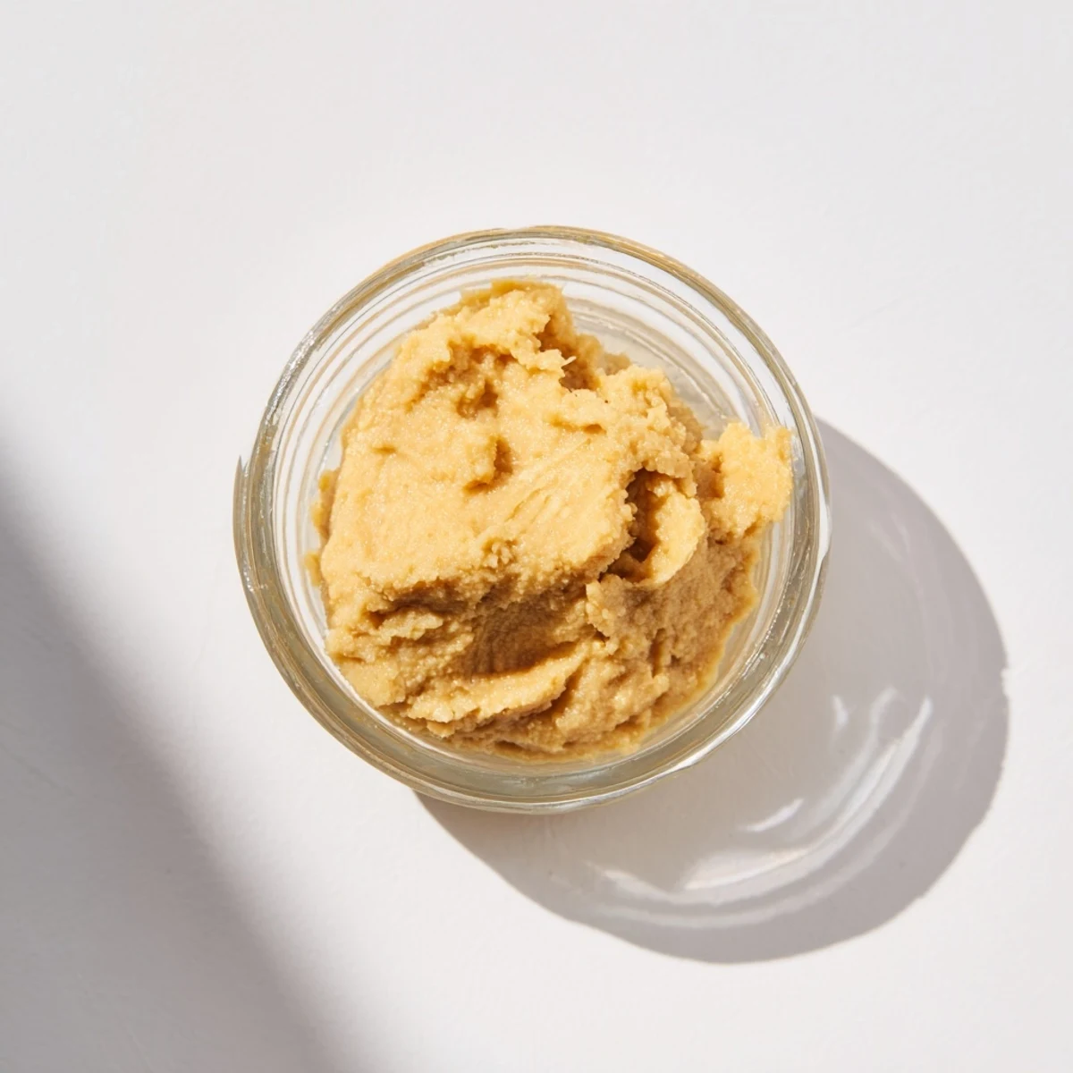 Homemade Crusher Garlic with a glistening texture, perfect for flavoring any savory dish.