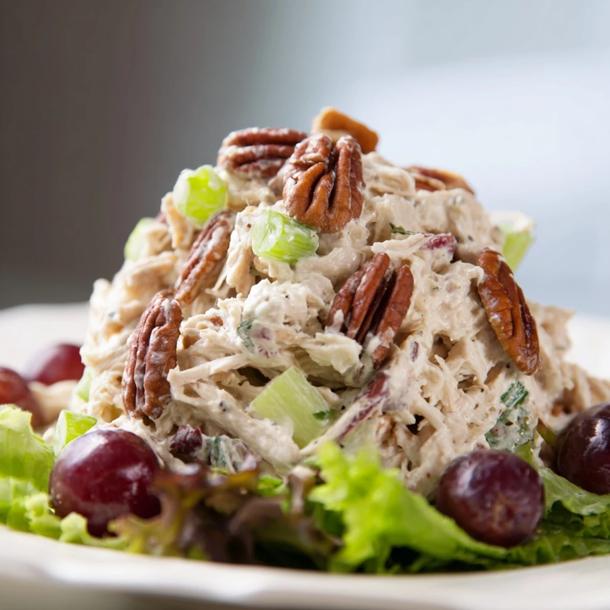 A bowl of Chicken Salad with Pecans and red grapes, ready for a quick lunch.