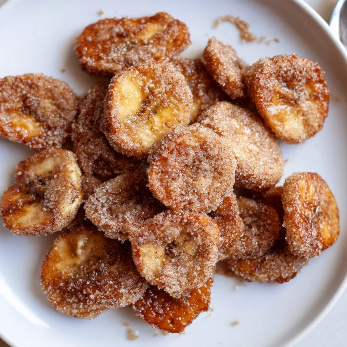 A bowl of Crispy Cinnamon Sugar Air Fryer Banana Chips perfect for snacking