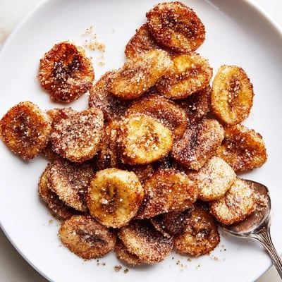 Warm Crispy Cinnamon Sugar Air Fryer Banana Chips with addictive crunchy texture